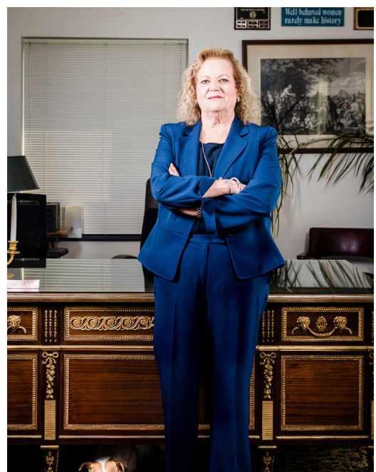 A portrait of Cynthia LaFave standing in a law office